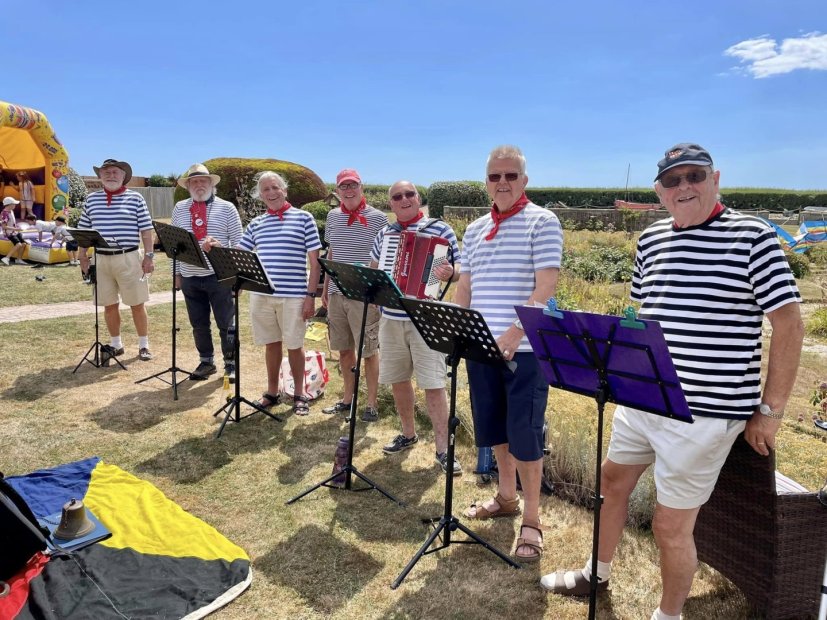 Volunteer choir singing for the residents
