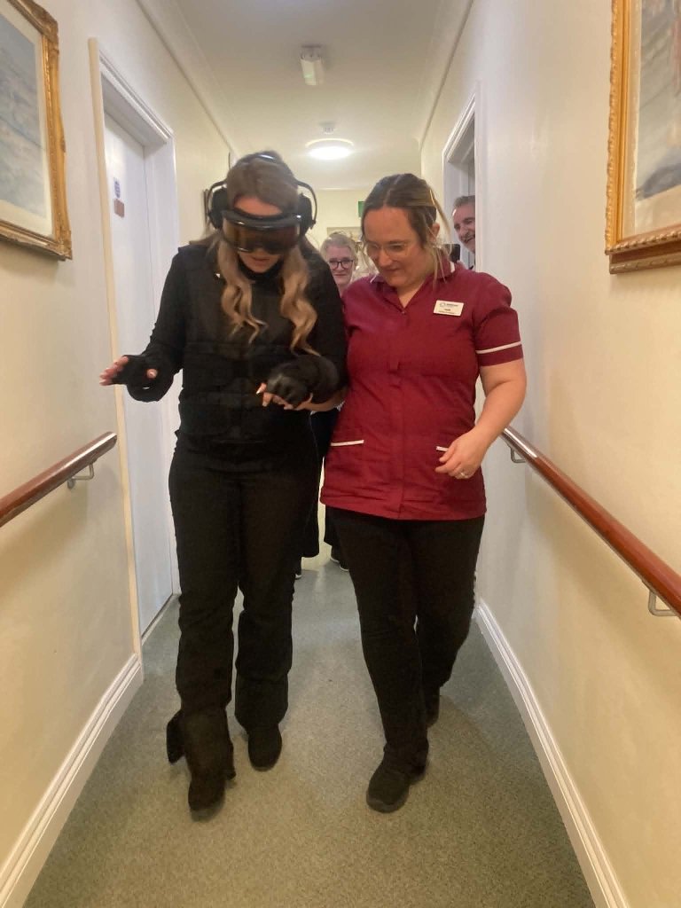 Colleague taking part in GERT suit training at The Malthouse care home